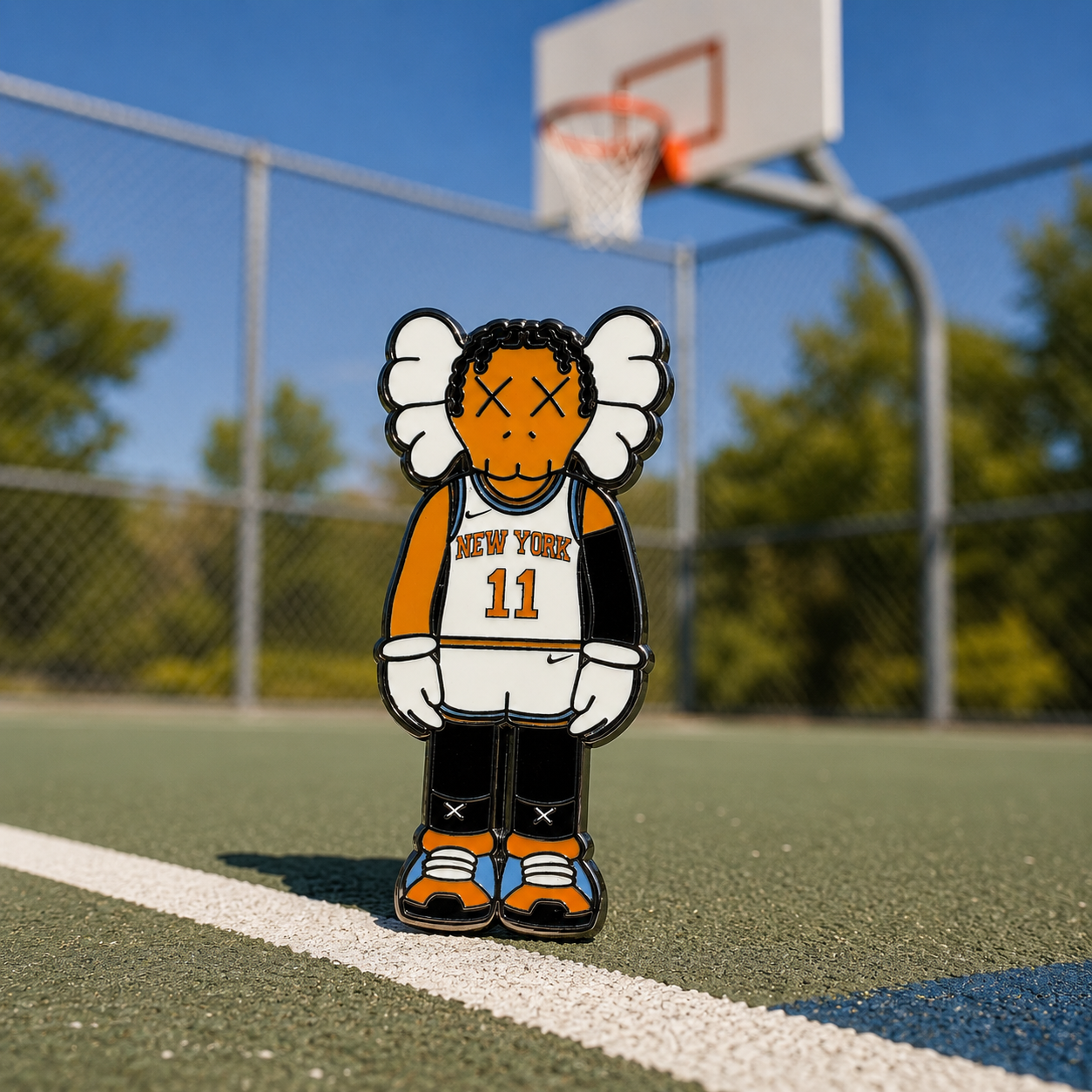 Jalen Brunson KAWS inspired New York Knicks enamel pin on cork board background