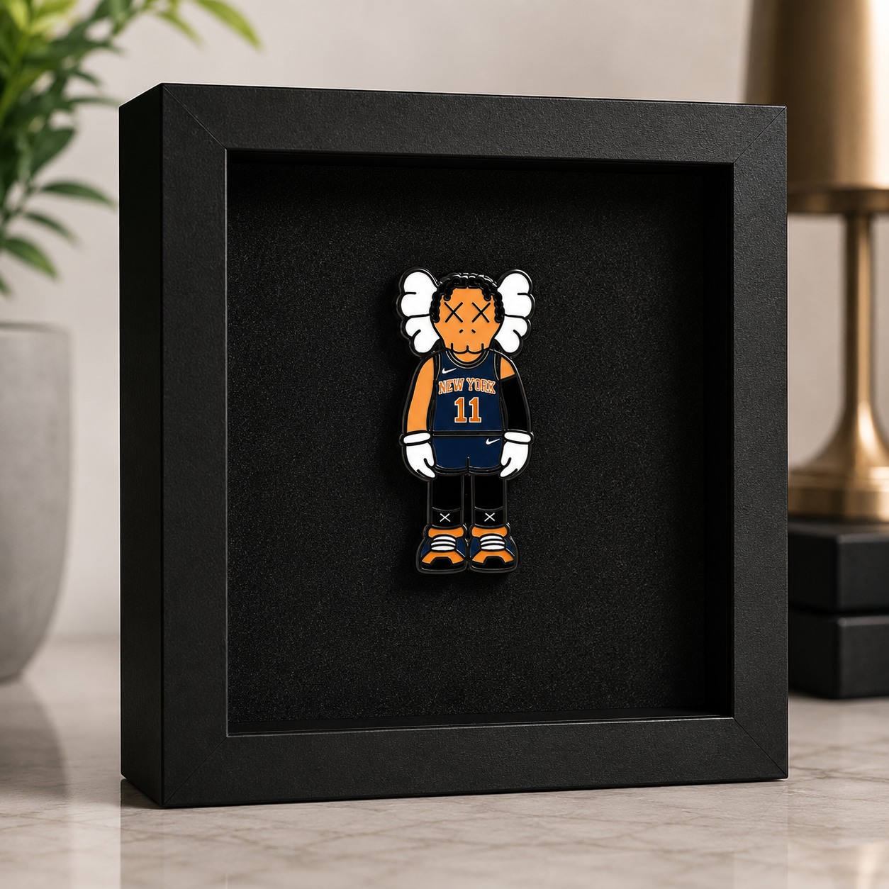 Jalen Brunson Knicks fan merch enamel pin with black nickel outline and X eye design