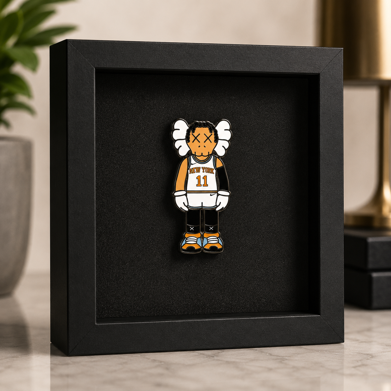 New York basketball enamel pin with cartoon art toy style and Knicks colorway