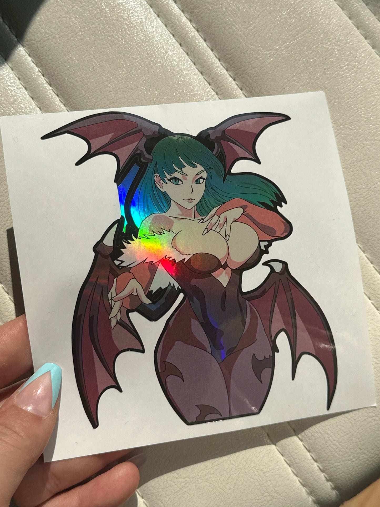 Morrigan Darkstalkers gamer sticker displayed on black iPad cover with goth desk setup